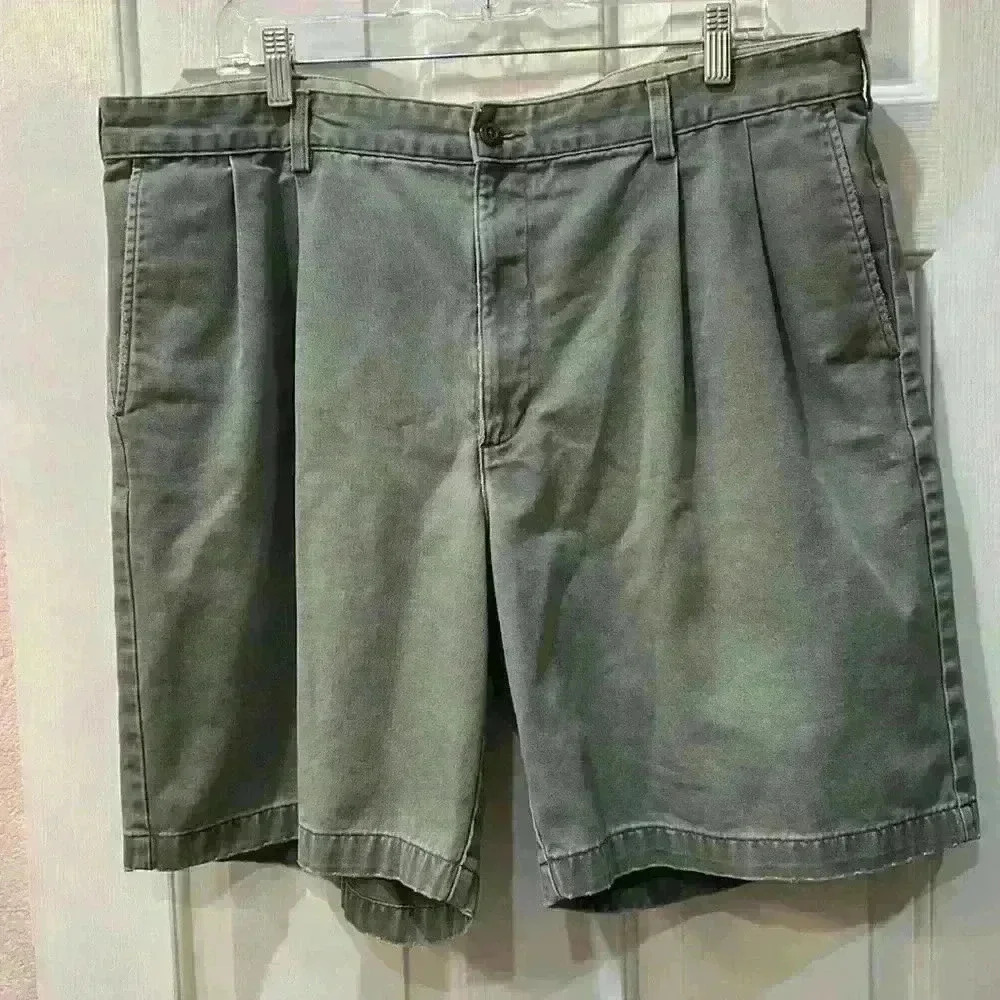 Eddie Bauer distressed twill army green shorts.